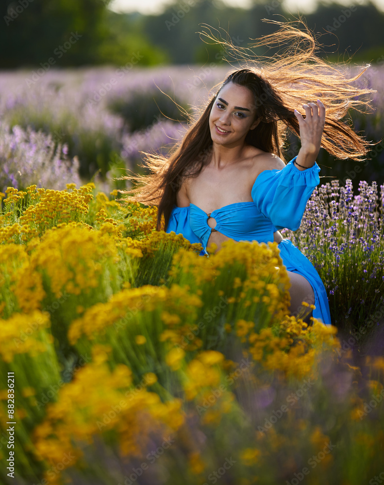 Wall mural Woman in a lavender field