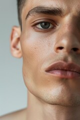 Obraz premium close up of man's face with clean shaven chin, no hair on his jawline, closeup shot, skin care commercial, 