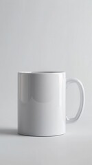 Fototapeta premium White ceramic mug isolated on white background.