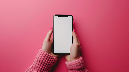 hand holding smartphone blank screen in pink background