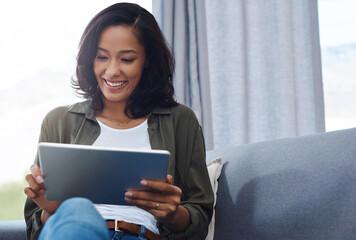 Woman, home and smile with tablet for online or digital application for house finance. Female...