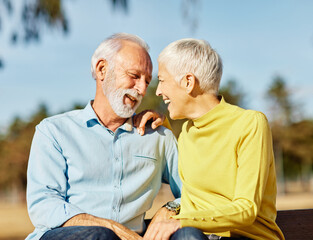 woman man outdoor senior couple happy lifestyle retirement together smiling love fun elderly active...