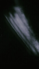 light beam pierces through the darkness, background for overlay design or screen blending photo editing