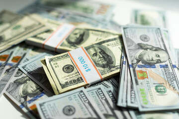 American dollars in one hundred banknotes. Lot of dollars close up