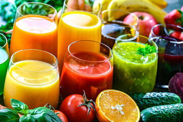 Glasses with fresh organic vegetable and fruit juices