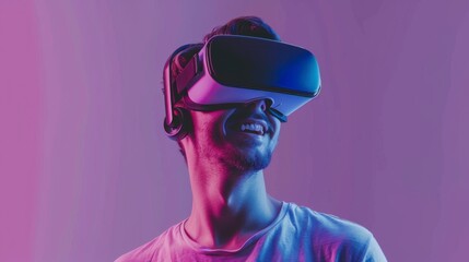 Joyful young man in a VR headset, exploring virtual worlds against a bright solid purple background with copy space