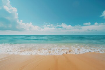 Gentle Waves Lapping at the Sandy Shore on a Bright Sunny Day