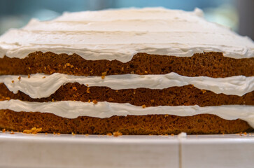 view of making cake with bread and cream