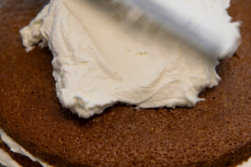 view of making cake with bread and cream