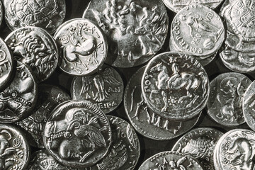 Pile of Ancient Silver Coins © allexxandarx