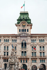 Obraz premium Trieste city hall and Fountain of the four continents at Piazza Unita d'Italia, Unity of Italy Square in Trieste, Italy