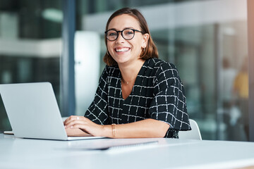Portrait, woman and typing in office with laptop for work as receptionist, administrative support...