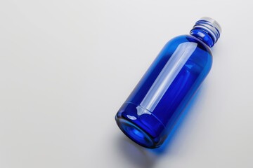 A top view of a royal blue water bottle, isolated on a white background