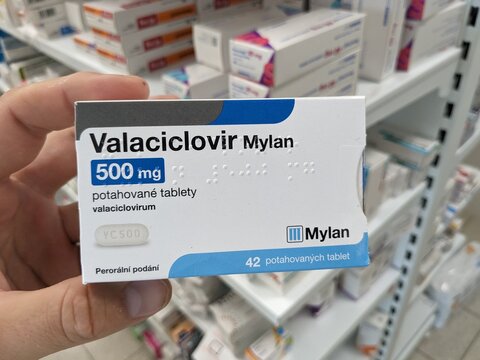 Prague, Czech Republic - July 10 2024: VALACICLOVIR MYLAN box of medication with VALACICLOVIR active substance by MYLAN, used for treatment of herpes and shingles.