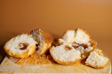 Sliced muffins on the table. Sweets.