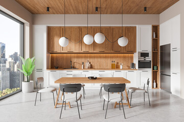 Stylish home kitchen interior with eating table and chairs, panoramic window
