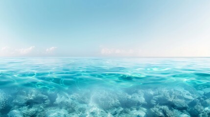 A serene view of the clear blue ocean with a calm sky. Ideal for travel, nature, or relaxation themed projects.