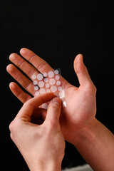 Acne pimple sticker to heal from inflamed zits on face. Dermatological acne patch to clean irritated skin from pimples. Effective nonmedical treatment for acne.