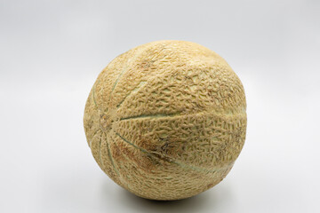Studio shoot of fresh ripe juicy whole melon closeup.