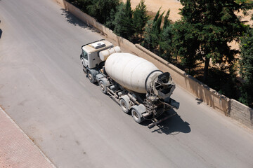 a concrete mixer goes on the road