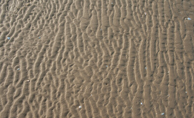 Traces of sand patterns on the beach