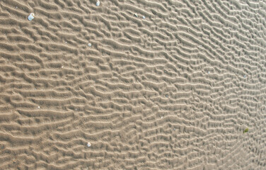 Traces of sand patterns on the beach