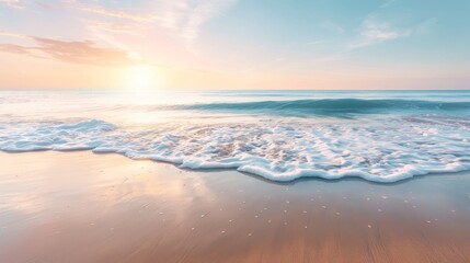 Serene beach scene at sunrise with gentle waves lapping the shore and a beautiful sky overhead, perfect for relaxation and tranquility.