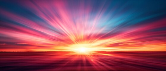 Obraz premium Stunning vibrant sunset with dramatic rays of light spreading across the colorful sky, creating a breathtaking and peaceful scene.