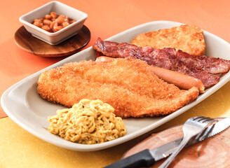 Fish Fillet, fish fry with pork slice, Tender Scrambled Eggs, beans and dip served in dish isolated on background side view of hong kong fasfood