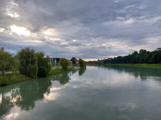 Fototapeta premium gray clouds over river Drava in Maribor in Europe. Overcast. Summer