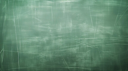 Green chalkboard with chalk marks. Back to school concept