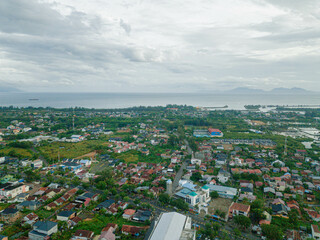 Obraz premium Aerial drone view of cityscape scenery in Banda Aceh, Aceh, Indonesia.