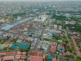 Aerial drone view of big city skyline scenery in Banda Aceh, Aceh, Indonesia.