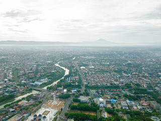 Aerial drone view of big city skyline scenery in Banda Aceh, Aceh, Indonesia.