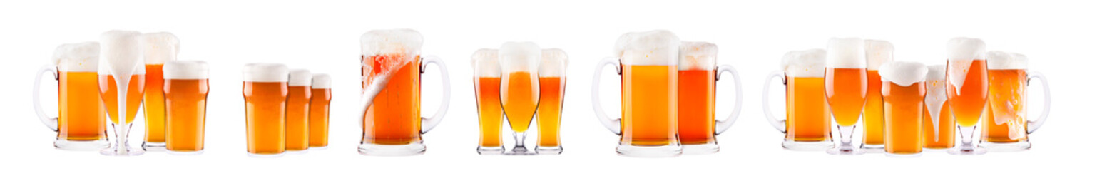 Set of fresh beer glasses with bubble froth isolated on white background.