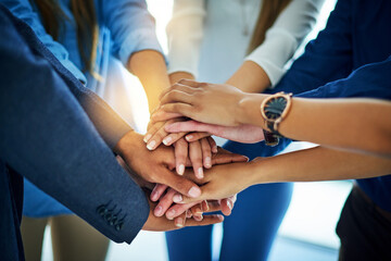 Group, business people or hands in huddle for collaboration, support or diversity in workplace community. Staff, trust or teamwork at company office with commitment, together for goal with solidarity