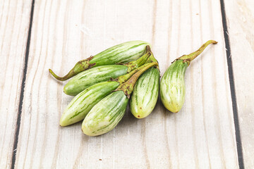 Small organic young green eggplant