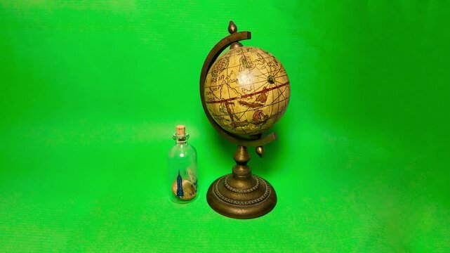 A vintage globe, green screen, slow motion, video 4k, 60 fps