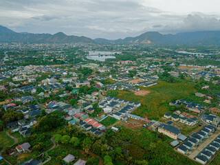 Obraz premium Aerial drone view of big city skyline scenery in Banda Aceh, Aceh, Indonesia.