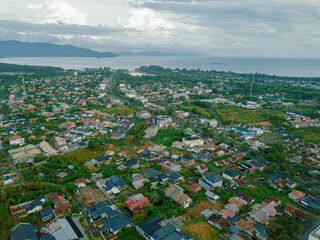 Aerial drone view of big city skyline scenery in Banda Aceh, Aceh, Indonesia.