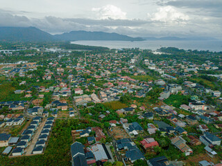 Aerial drone view of big city skyline scenery in Banda Aceh, Aceh, Indonesia.
