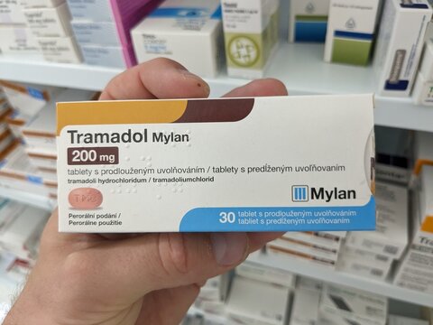 Prague, Czech Republic - July 10 2024: TRAMADOL MYLAN box of medication with TRAMADOL active substance by MYLAN, used for treatment of moderate to severe pain.

