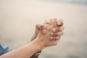 just engaged, couple holding hands, proposal ring
