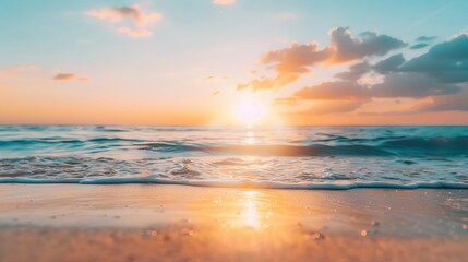 Fototapeta premium A serene beach sunset with vibrant colors reflecting on the waves and golden sand, creating a tranquil and picturesque seascape.