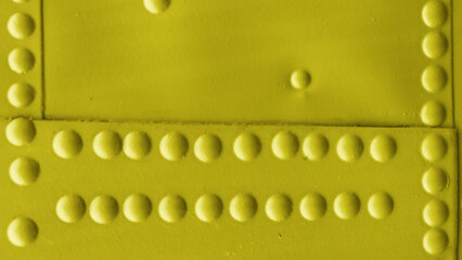 Abstract metal background with rivets close-up.