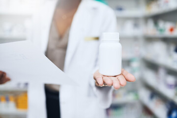 Woman, pharmacy and bottle in hand with paper, customer prescription and medical product or...