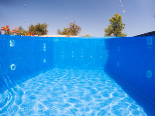 crystal clear blue water in swimming pool