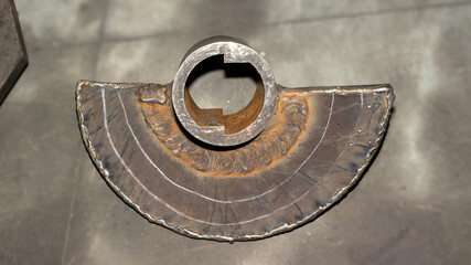 A metal object with a hole in the middle of it