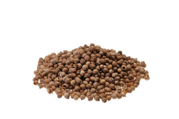 Pile of coriander seeds (Coriandrum sativum). Close-up, front view, isolated on a white background