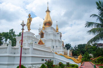Fototapeta premium Buddhist temple at Nobo Shalbon Bihar (New Shalbon Bihar), Kotbari, Cumilla, Bangladesh. It has been built on about two and a half acres of hilly land in the Kotbari area of Cumilla.